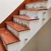 cầu thang gỗ căm xe cổ bậc sơn trắng