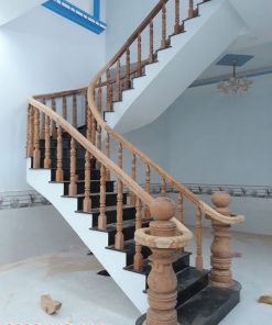 tay vịn omega cầu thang gõ đỏ