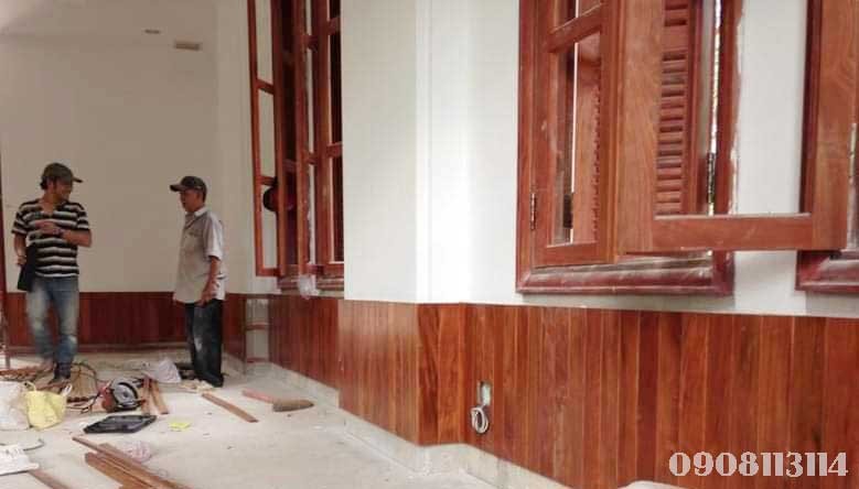 op vach tuong bang go cam xe lao